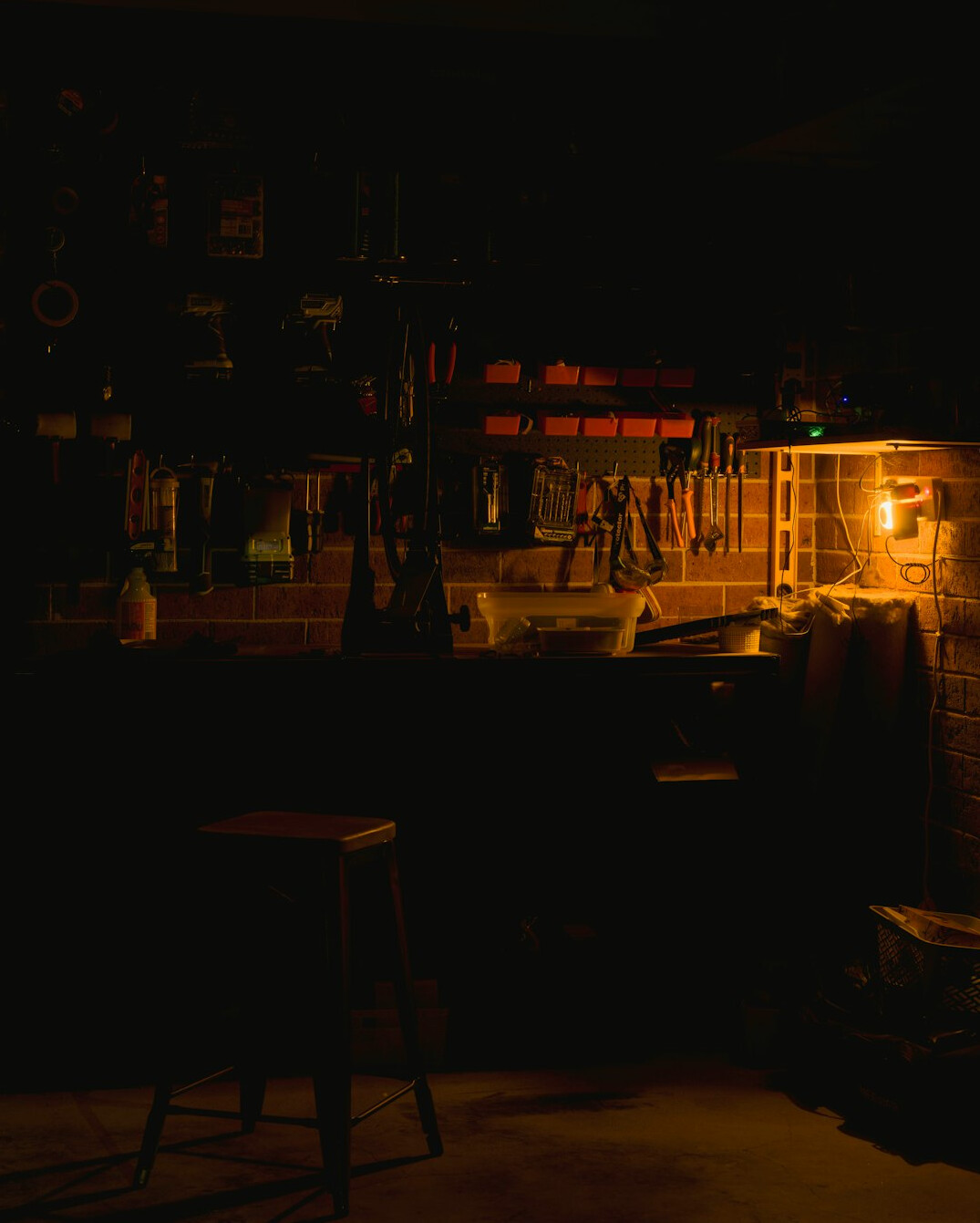 Tidy home garage workshop with tools on a workbench