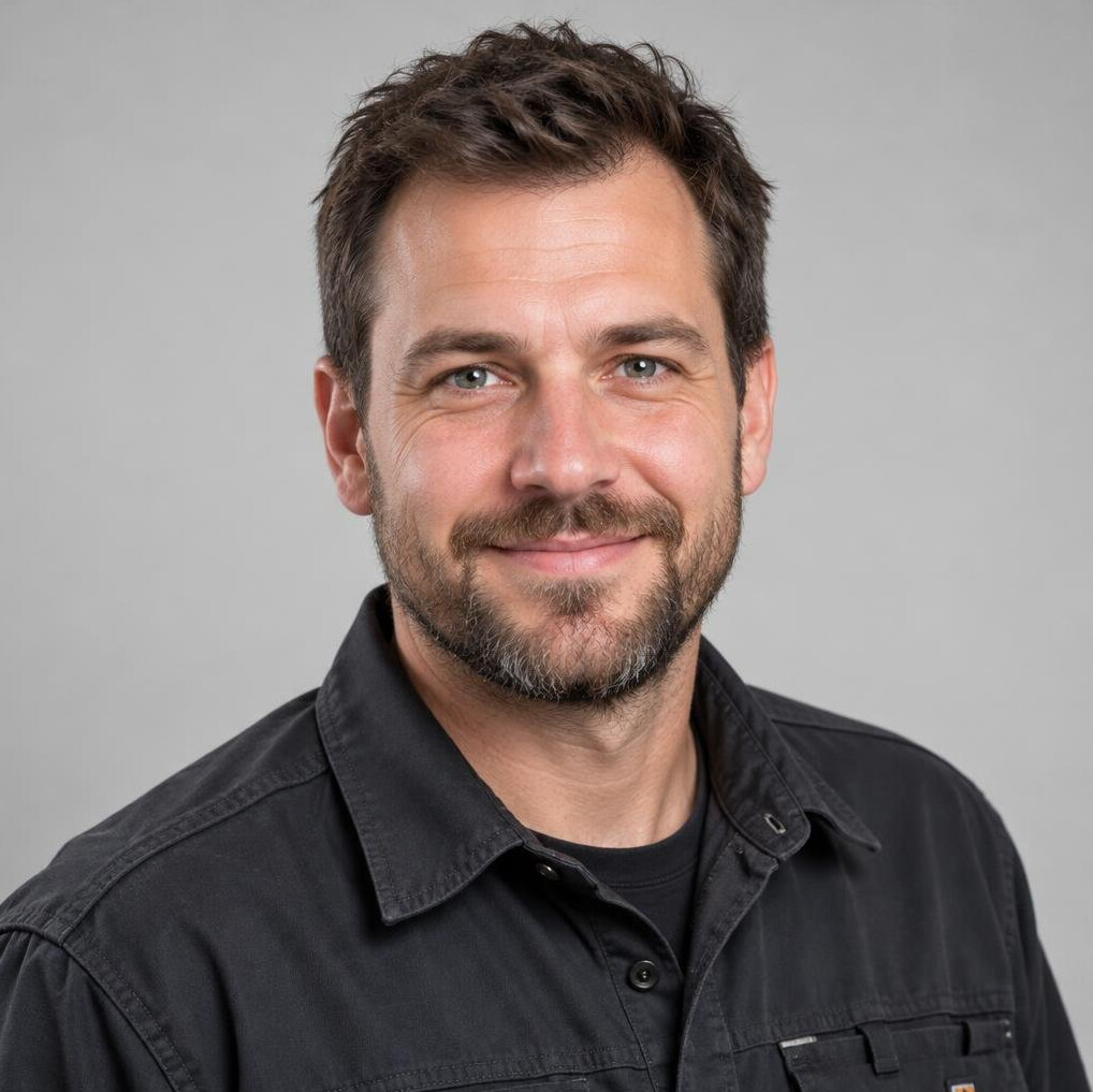 Portrait of a smiling man with a short beard